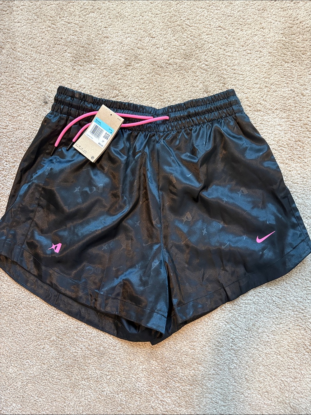 Nike Women’s Black Athletic Shorts with Pink Drawstring and Logo